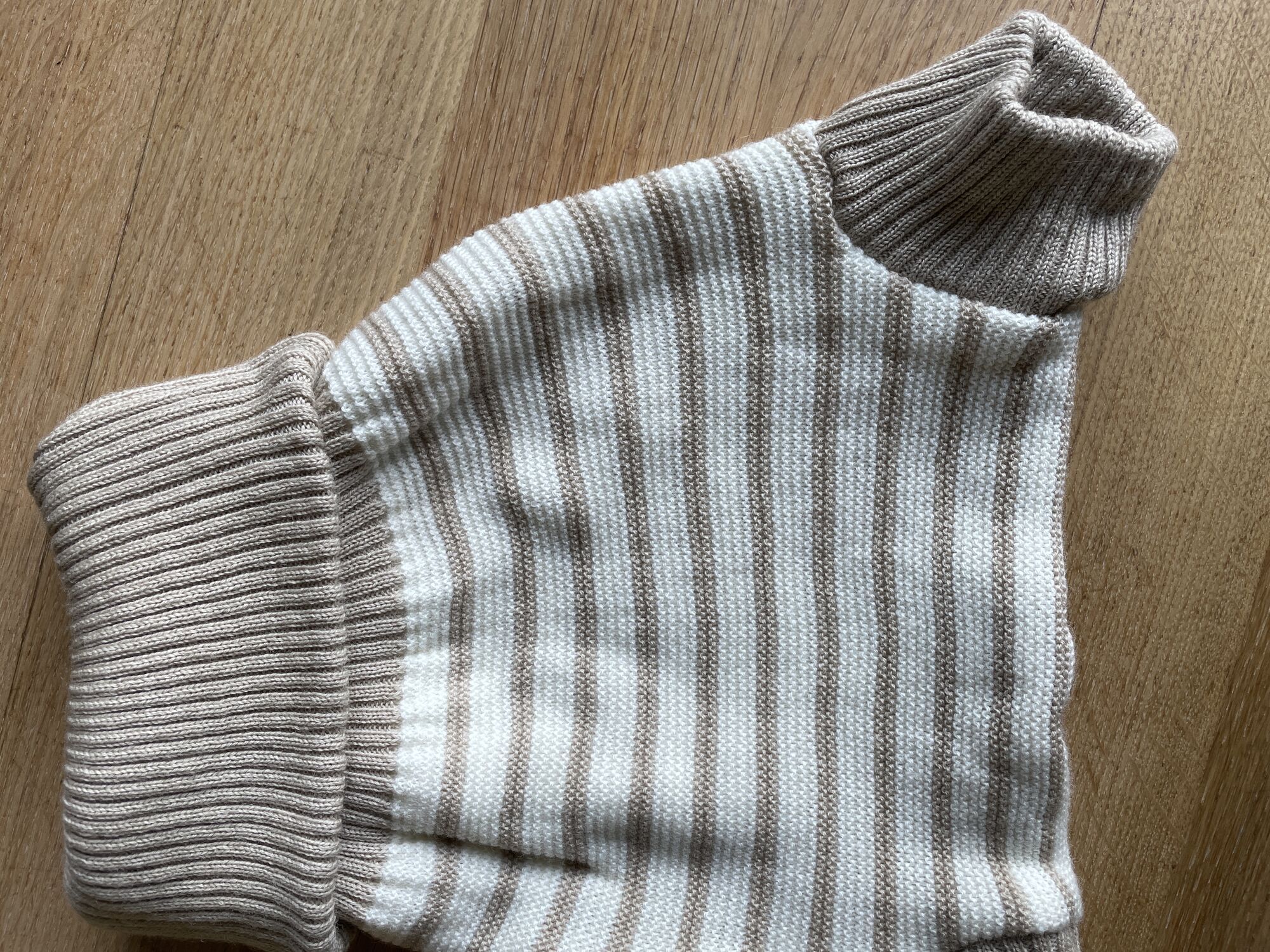 A real photo of Wool Cover Beige-Ecru by Mandy (1)